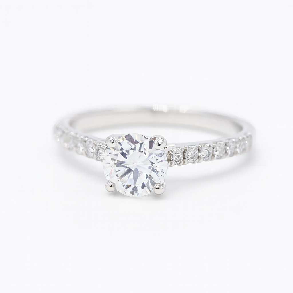 Platinum Solitaire Four Claw Diamond Ring With Diamond Shoulders 1.06ct