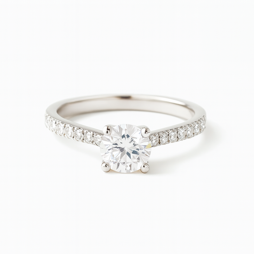 Platinum Solitaire Four Claw Diamond Ring With Diamond Shoulders 0.73ct